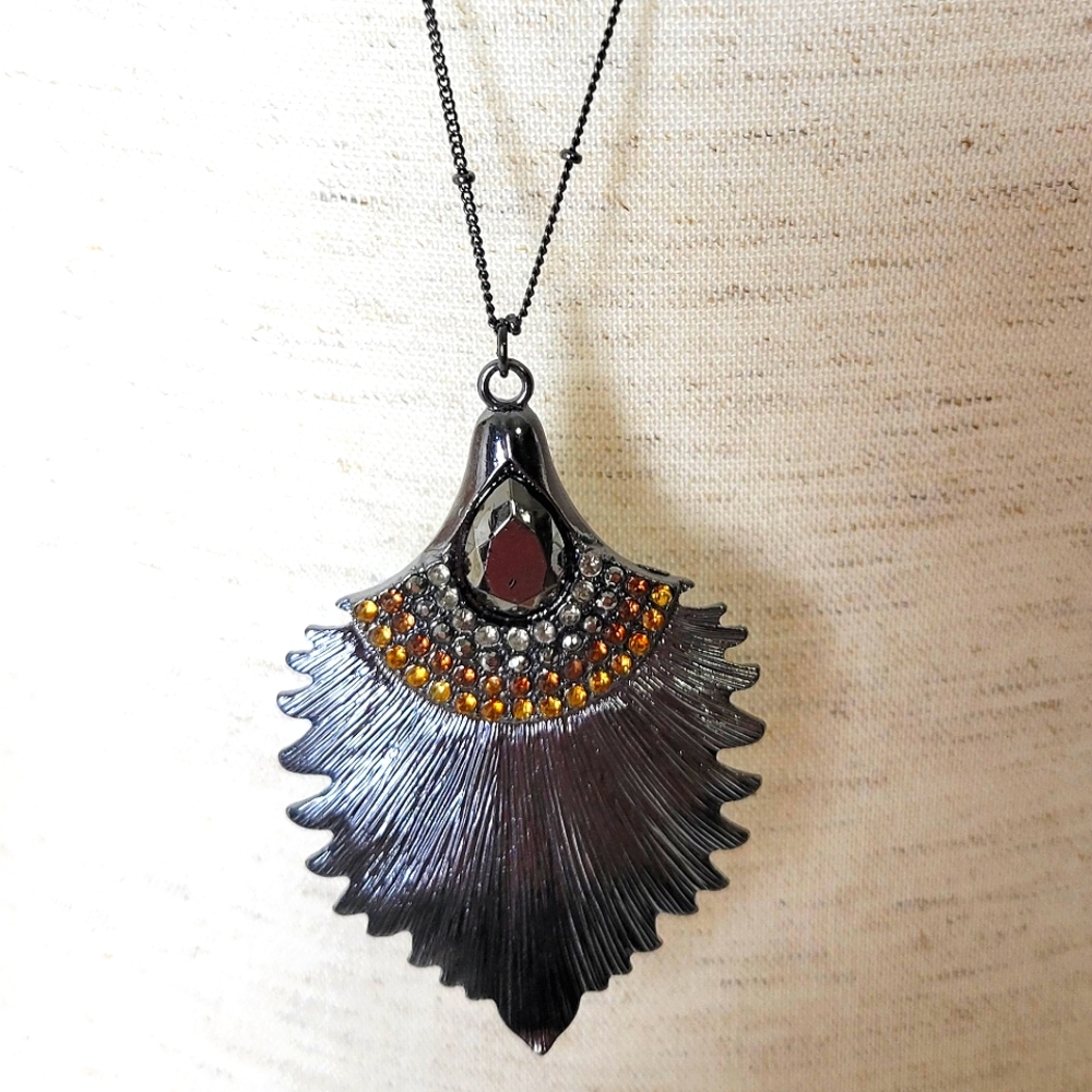 Vintage Long Chain Necklace. Feather Shape Alloy Charm on a beaded chain.